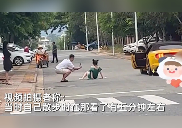 女子躺馬路中間追車拍視頻640.jpg
