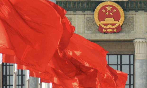 政法干警熱議政府工作報(bào)告：保障民生 司法為民
